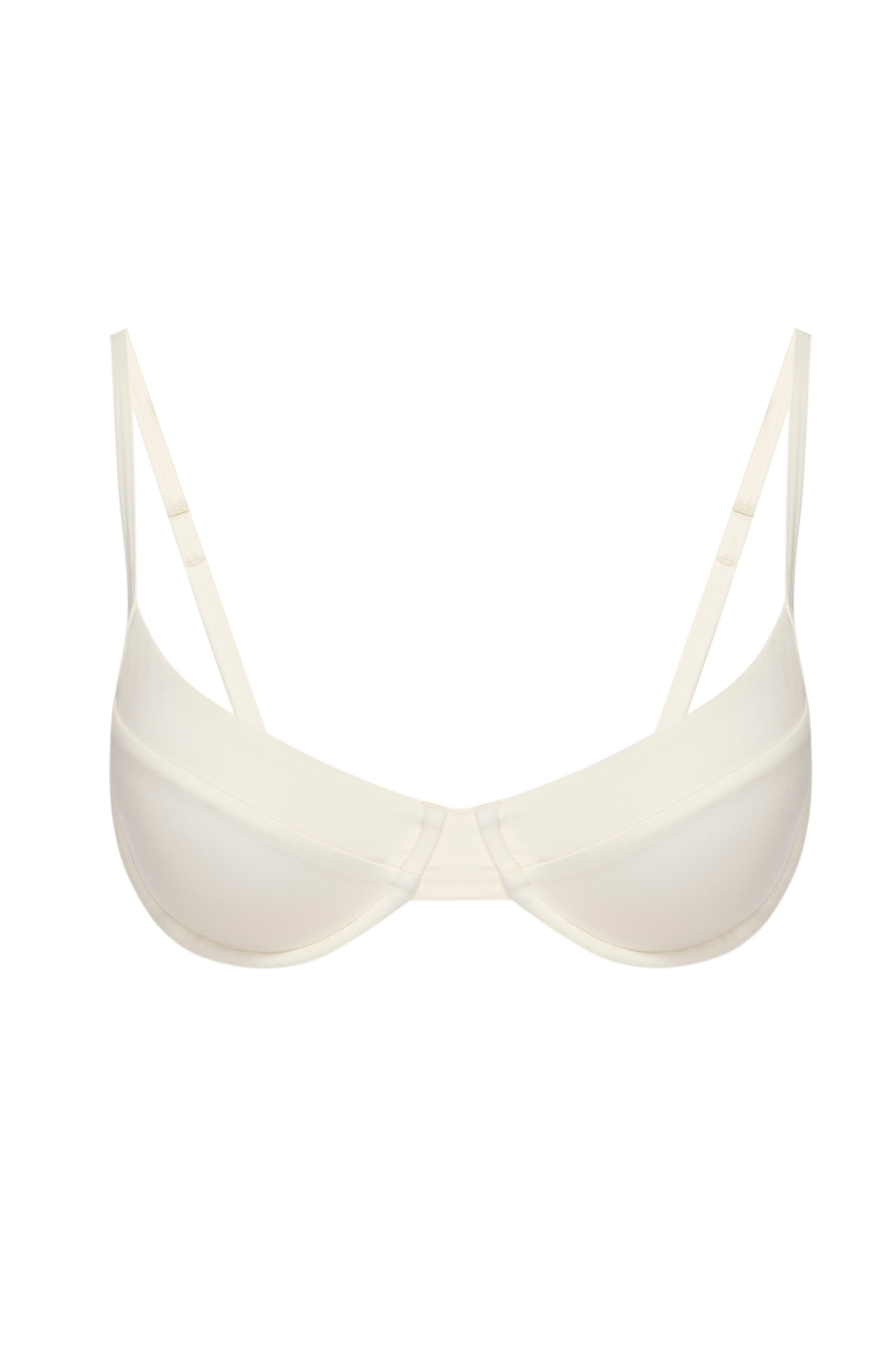 Ivory underwire balconette bra with thin adjustable straps and center front seam on white background